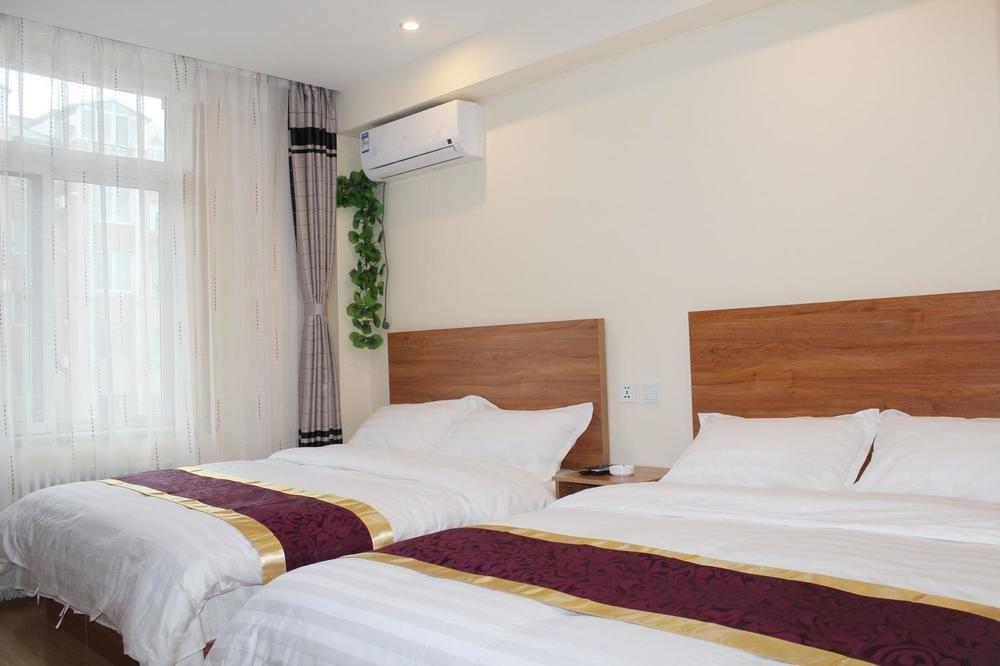 Dalian Kai Bin Business Inn داليان المظهر الخارجي الصورة